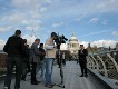  TV crew filming on the Millenium bridge, with a St Pauls backdrop