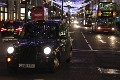  London taxi and buses on Regent Street at night